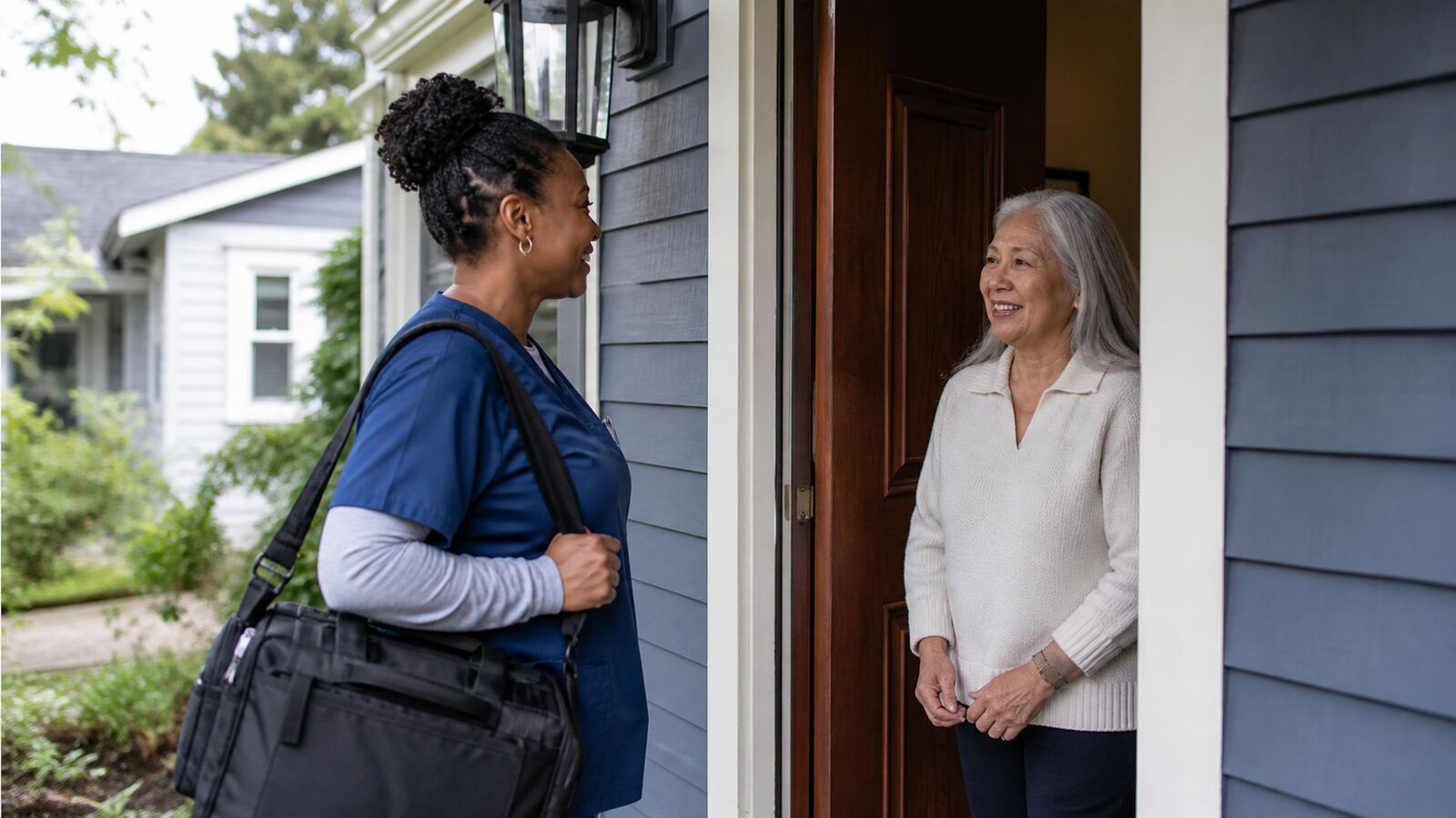 A home health visit, at the front door.